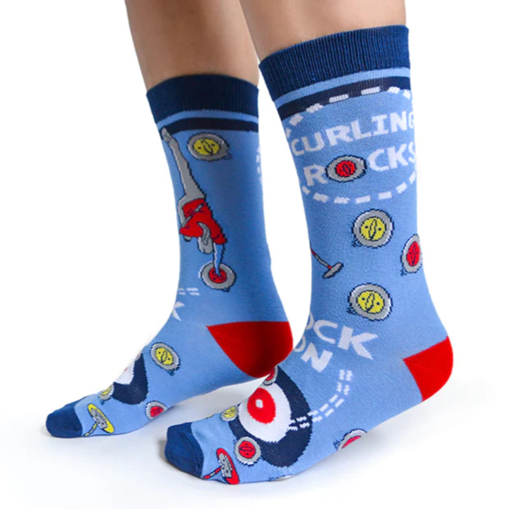 A pair of blue socks with a curling rock and text design, indicating a sporty theme.